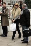 th_41461_celebrity_paradise.com_TheElder_ClaudiaSchiffer2010_12_07_schoolruninLondon20_122_169lo.jpg