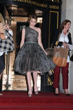 th_52562_EmmaRoberts_MarchesaFashionshowatThePlazaHotelinNewYorkSeptember132011_By_oTTo6_122_463lo.jpg