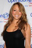 Mariah Carey shows cleavage in low-cut black dress at 5th Annual Operation Smile Gala in New York City